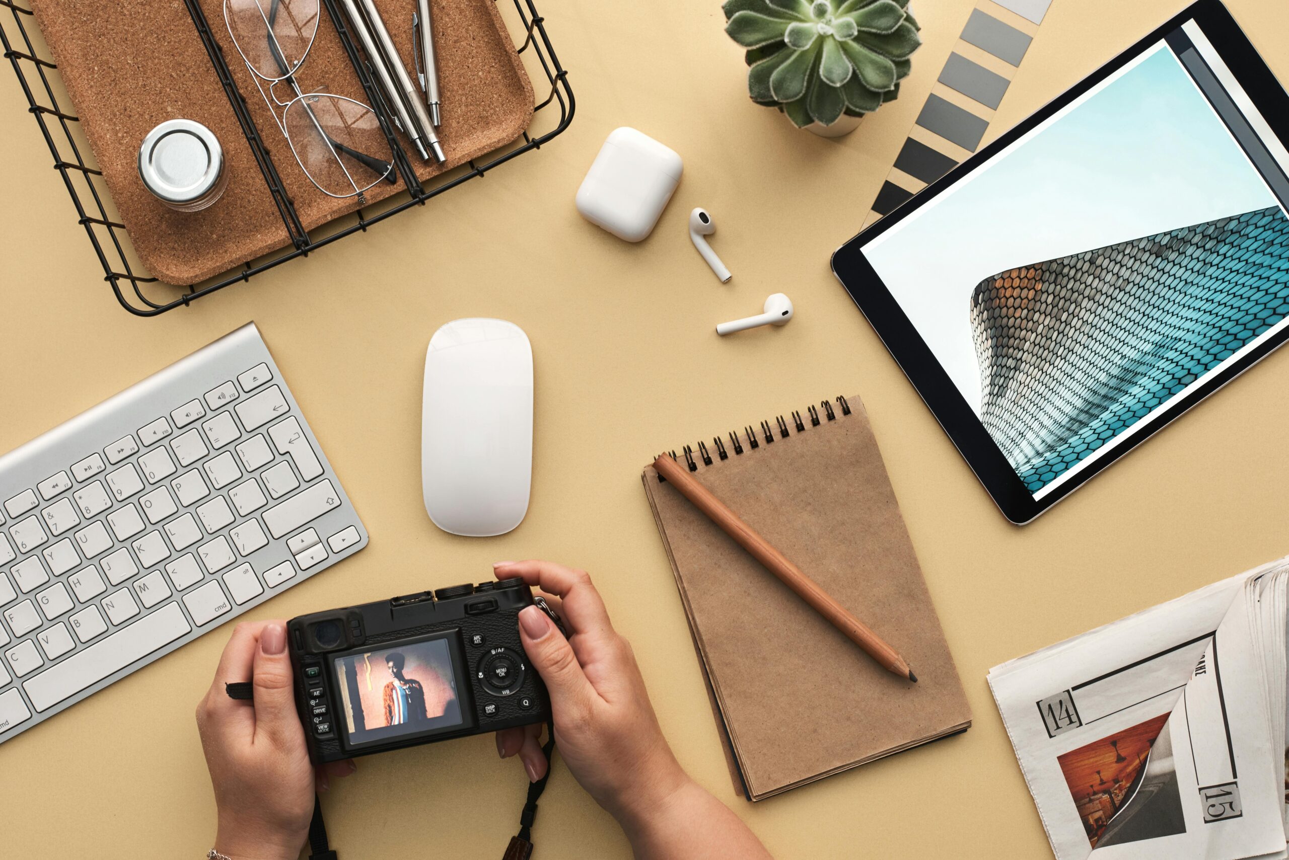 a desk with equipment for photography job